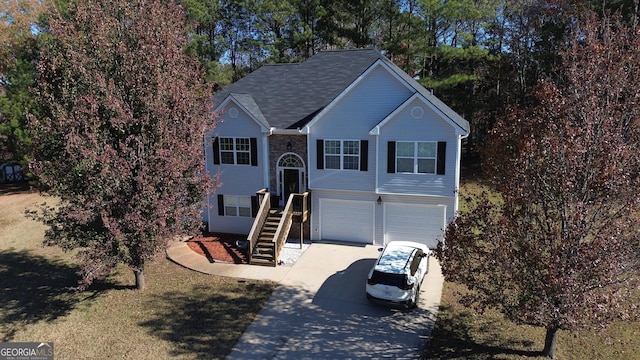 split foyer home featuring a garage