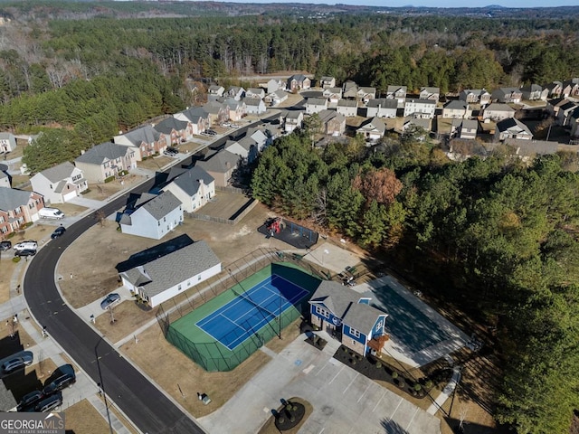 bird's eye view with a forest view and a residential view