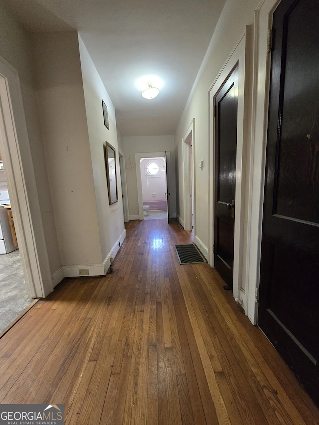 hall featuring hardwood / wood-style floors