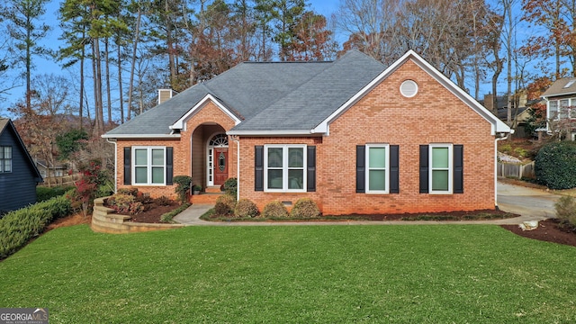 view of front property with a front lawn