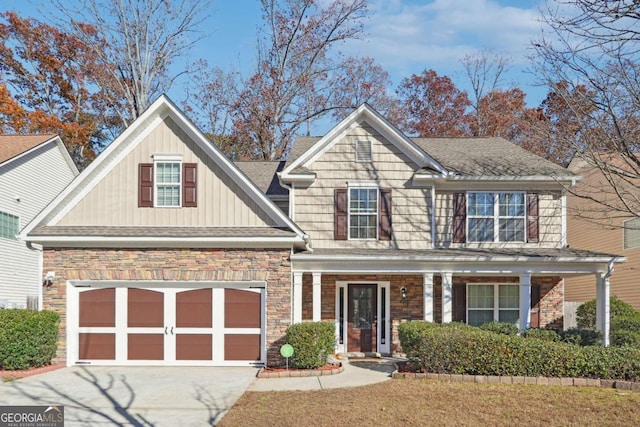 view of front of property with a garage