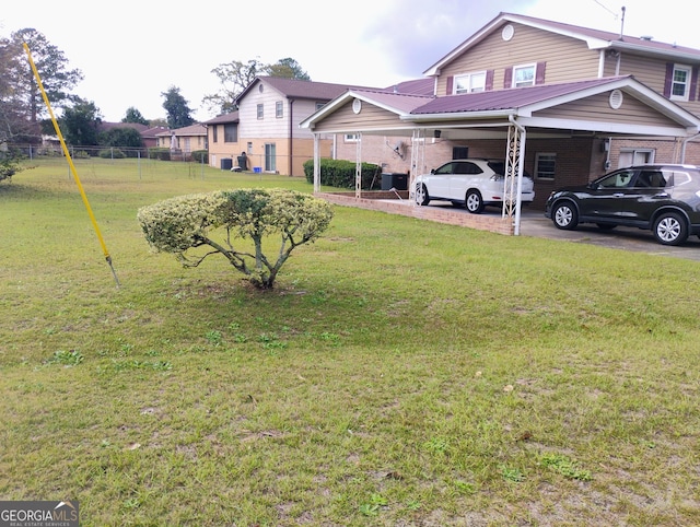 view of yard featuring a carport