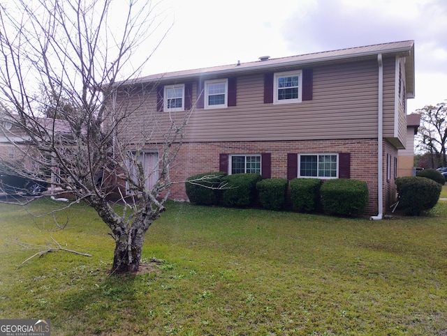 exterior space with a front yard