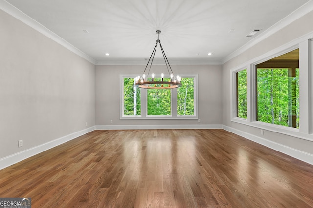 unfurnished dining area featuring plenty of natural light and baseboards