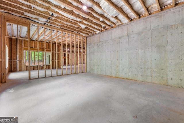 interior space featuring unfinished concrete floors