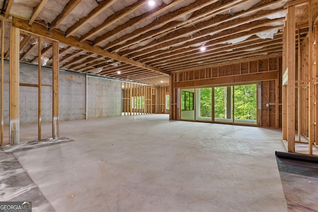 misc room featuring unfinished concrete floors