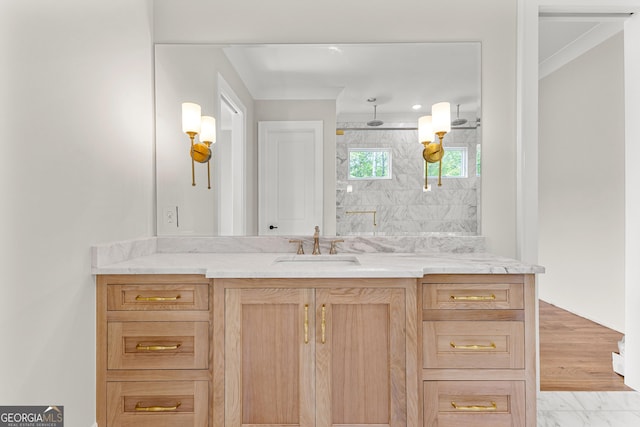 full bathroom with a marble finish shower, vanity, and marble finish floor