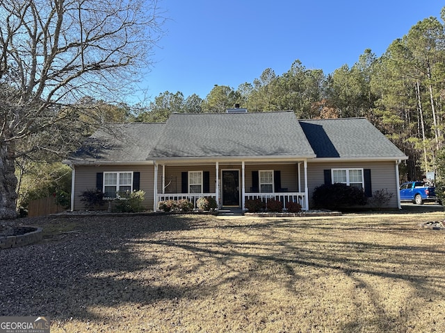 ranch-style house with covered porch