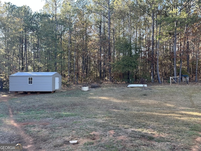 view of yard with a storage shed