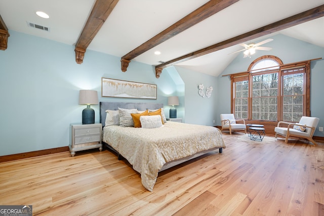 bedroom with ceiling fan, lofted ceiling with beams, and wood-type flooring