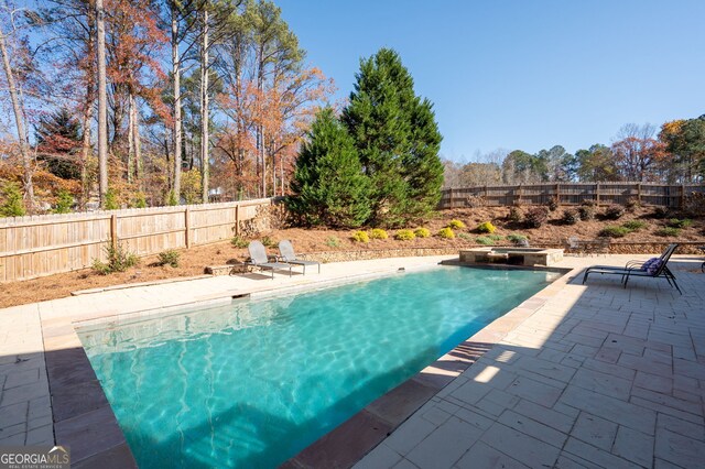 surrounding community featuring a pergola and a patio area