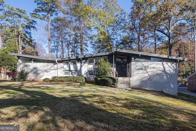 exterior space with a front yard