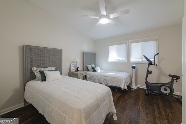 bedroom featuring vaulted ceiling, ceiling fan, and dark wood-type flooring