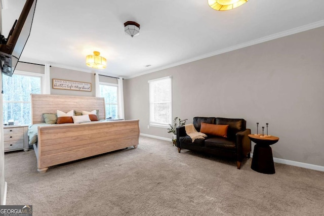 carpeted bedroom featuring ornamental molding