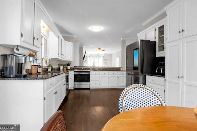 kitchen with white cabinetry, sink, ceiling fan, crown molding, and appliances with stainless steel finishes