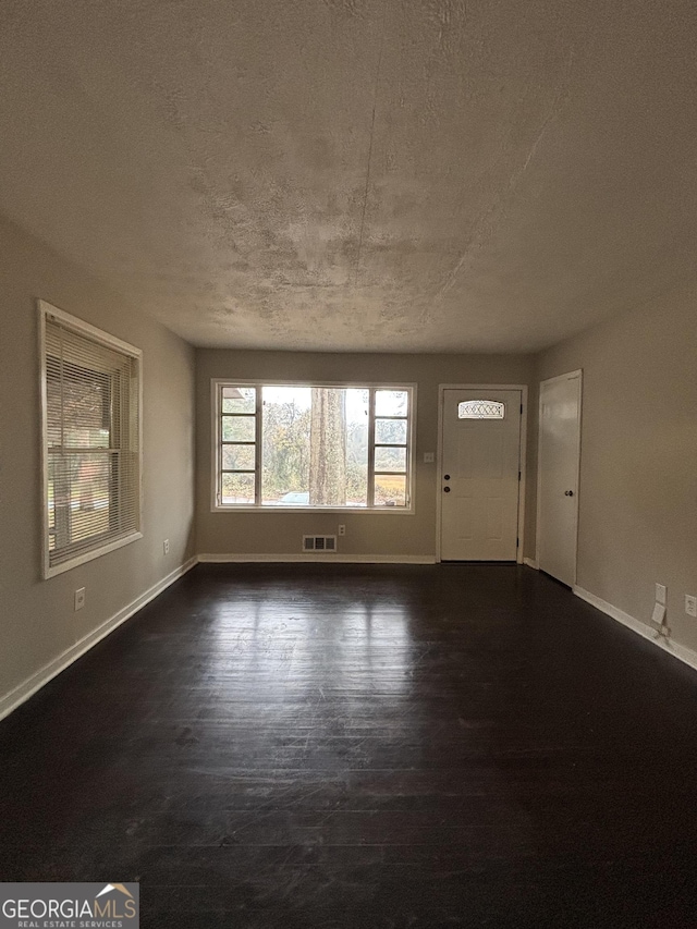 interior space with dark wood-type flooring