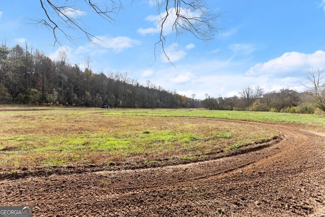 exterior space with a rural view