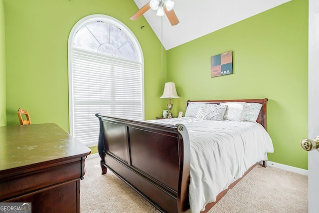 carpeted bedroom featuring ceiling fan and lofted ceiling