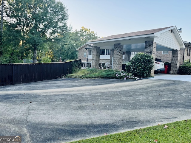 view of front of property with a carport