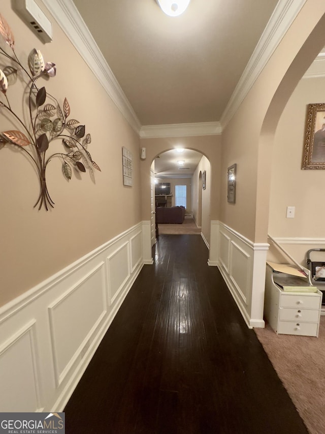 hall featuring dark hardwood / wood-style flooring and ornamental molding