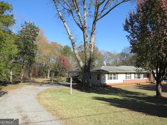 exterior space with a front yard