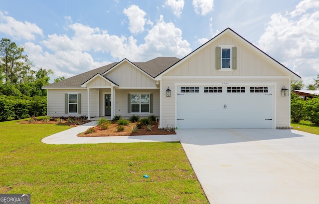 5704 Payton Pl, Lake Park, GA 31636 - view of front of home with a front lawn, board and batten siding, concrete driveway, and roof with shingles