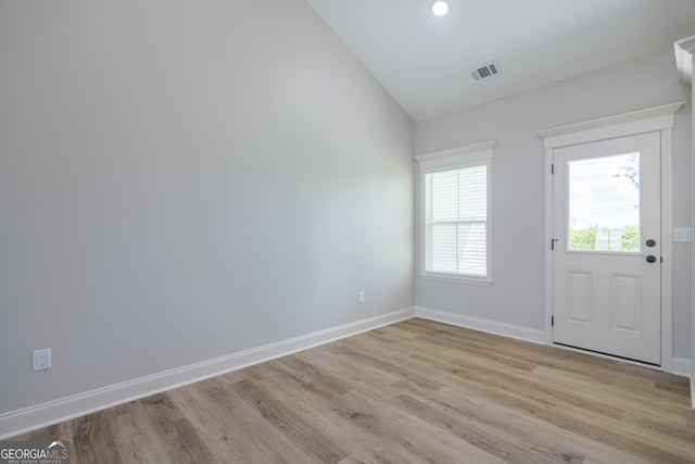 5704 Payton Pl, Lake Park, GA 31636 - foyer entrance with baseboards, lofted ceiling, visible vents, and light wood finished floors