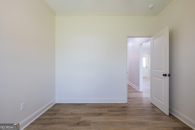 5704 Payton Pl, Lake Park, GA 31636 - spare room with baseboards, crown molding, and wood finished floors
