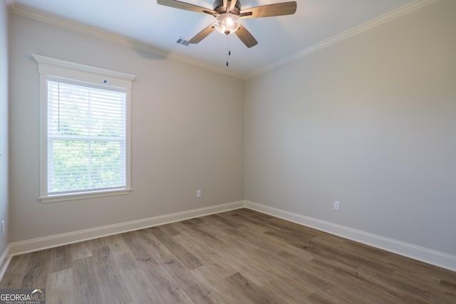 5704 Payton Pl, Lake Park, GA 31636 - spare room with wood finished floors, baseboards, visible vents, ceiling fan, and ornamental molding