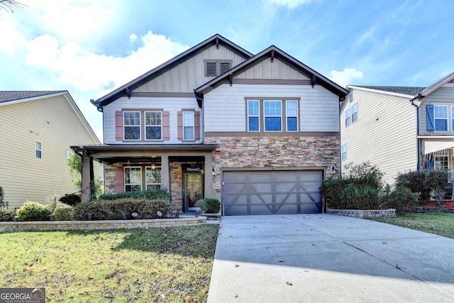 craftsman-style house with a garage and a front yard