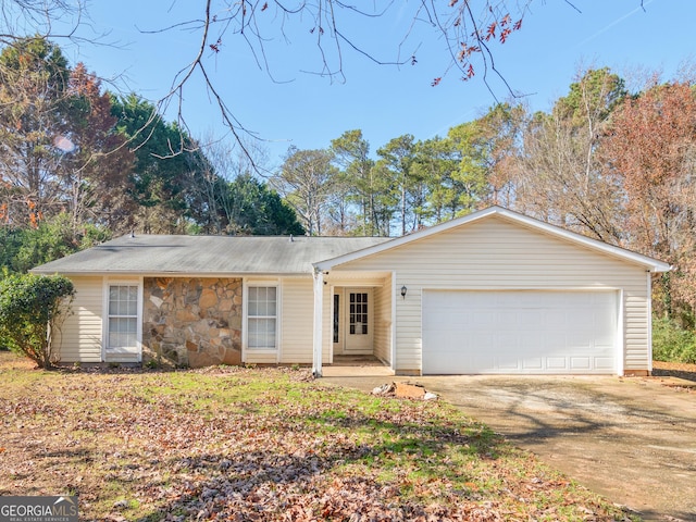 single story home with a garage