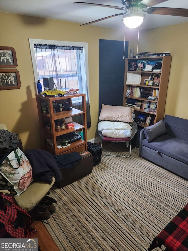 living room with ceiling fan