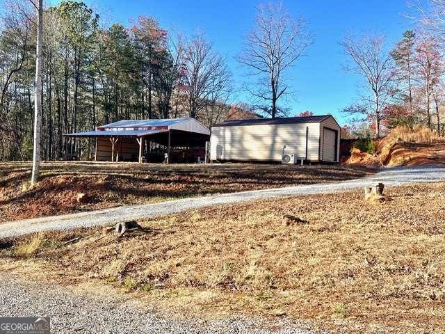 view of outbuilding with a garage