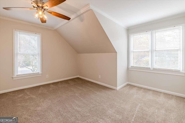 additional living space with lofted ceiling, carpet floors, and a wealth of natural light