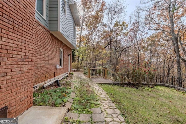 view of yard with a deck