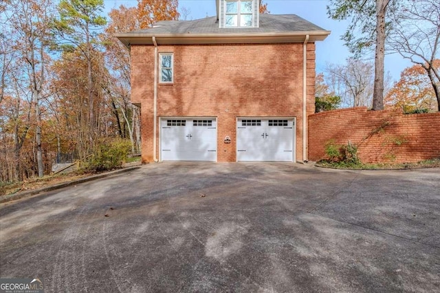 view of home's exterior with a garage