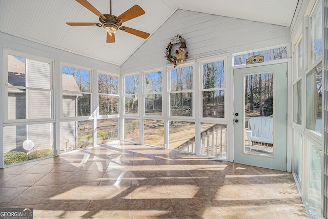 sunroom / solarium featuring ceiling fan and lofted ceiling