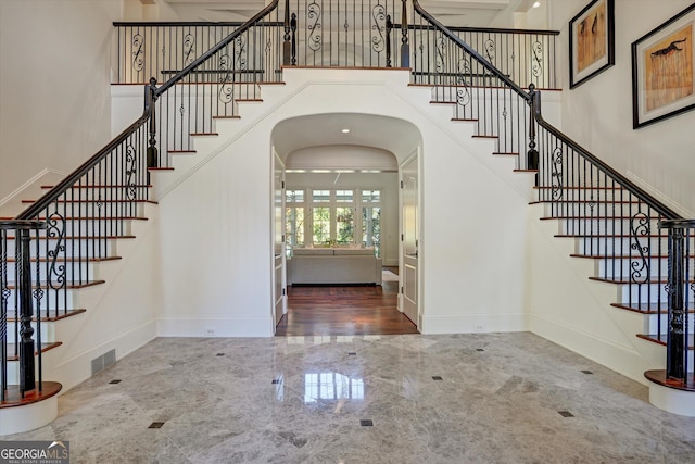 foyer with a high ceiling