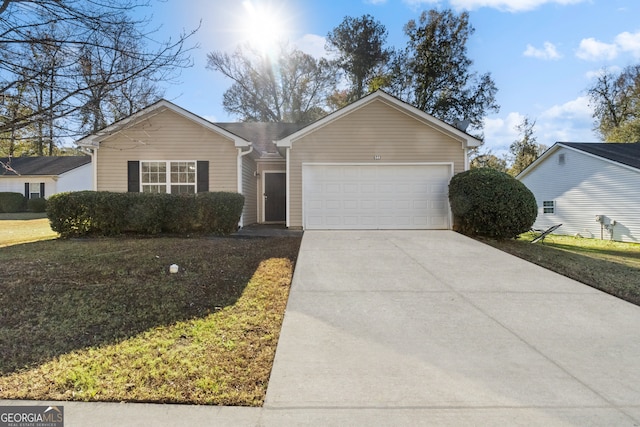 ranch-style home featuring a garage and a front lawn