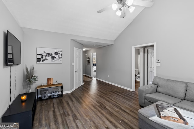 living room with ceiling fan, dark hardwood / wood-style flooring, and high vaulted ceiling