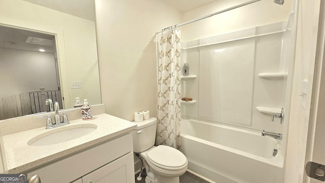 full bathroom featuring vanity, toilet, and shower / bath combo with shower curtain