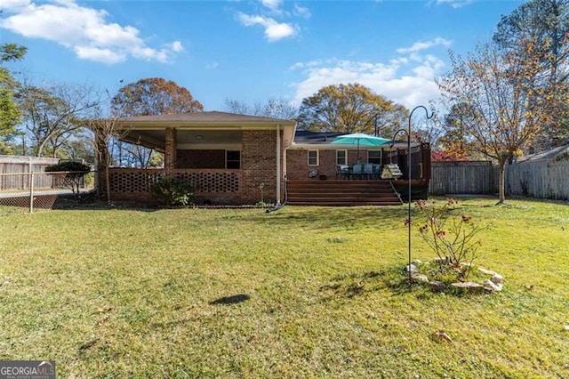 view of yard featuring a wooden deck