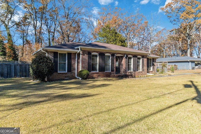 single story home with a front yard