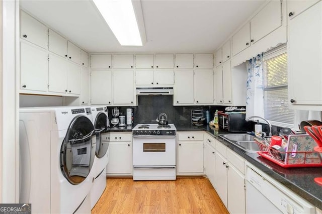 kitchen featuring light hardwood / wood-style floors, independent washer and dryer, white appliances, and white cabinetry