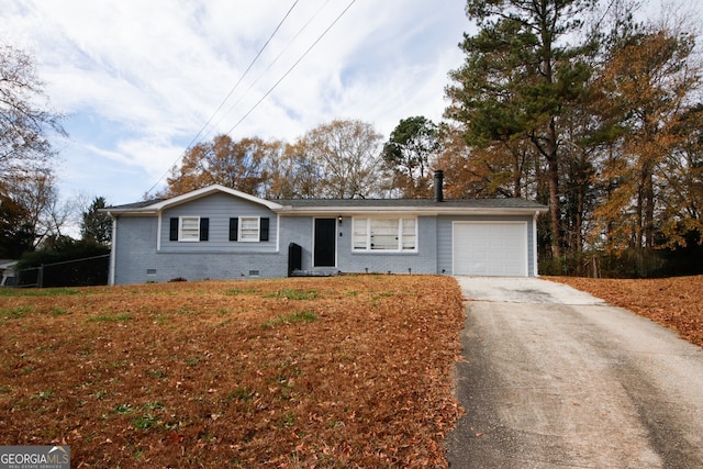 single story home with a garage