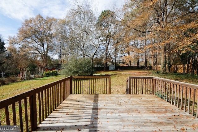 deck featuring a yard