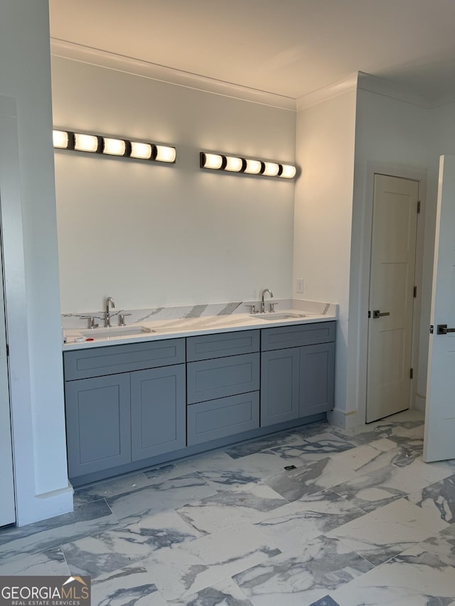 bathroom with vanity and crown molding