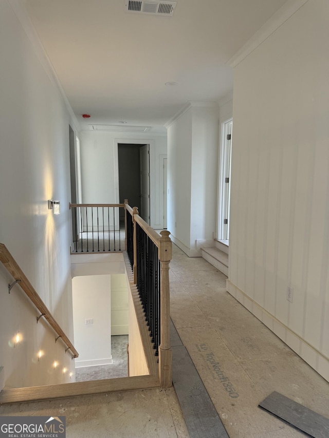 interior space with crown molding