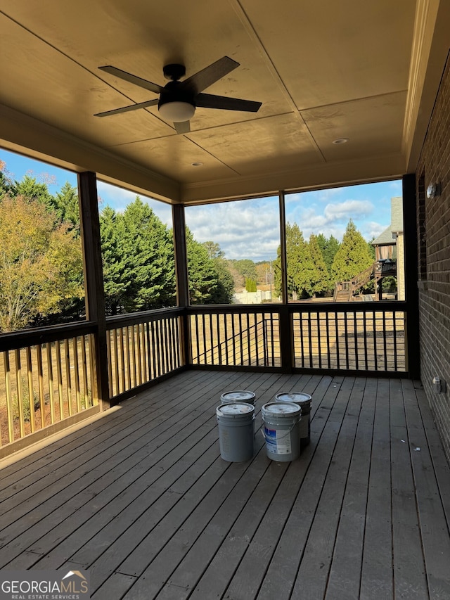 wooden deck with ceiling fan