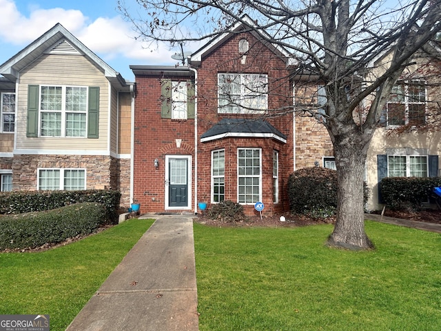 view of front facade featuring a front lawn